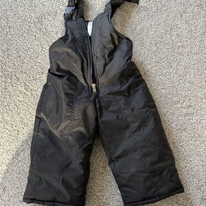 Black Bib-Style Snow Overalls with Waterproof Material and Adjustable Straps